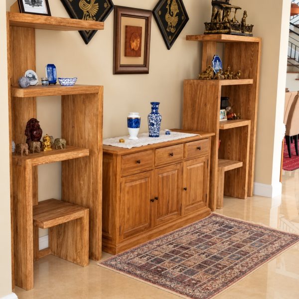 Solid teak display shelf in an elegant living room interior